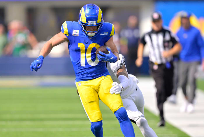 Oct 8, 2023; Inglewood, California, USA; Los Angeles Rams wide receiver Cooper Kupp (10) runs for a first down before he is stopped by Philadelphia Eagles cornerback Darius Slay (2) in the first half at SoFi Stadium.